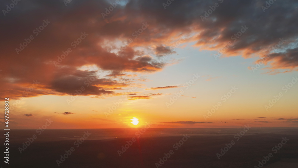 Aerial View Of Sunshine Bright Dramatic Sky. Scenic Colorful Sky At Dawn. Sunset Sky Above Autumn Field And Meadow, Forest Landscape In Evening. Top View From High Attitude. Hyper