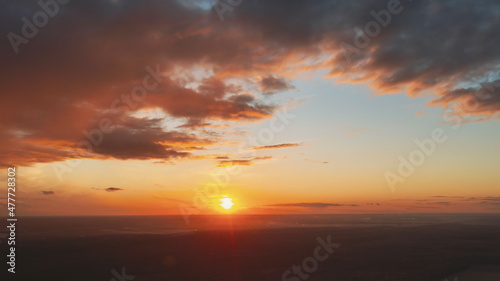 Aerial View Of Sunshine Bright Dramatic Sky. Scenic Colorful Sky At Dawn. Sunset Sky Above Autumn Field And Meadow, Forest Landscape In Evening. Top View From High Attitude. Hyper