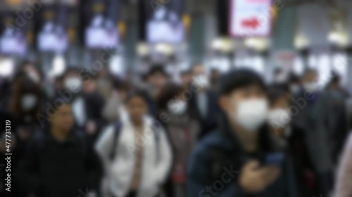 Wallpaper Mural Blurred defocused view of large crowd people wearing surgical mask and walking in subway exit. Omicron variant coronavirus pneumonia has been spreading into many cities. 2019-nCoV epidemic of China. Torontodigital.ca