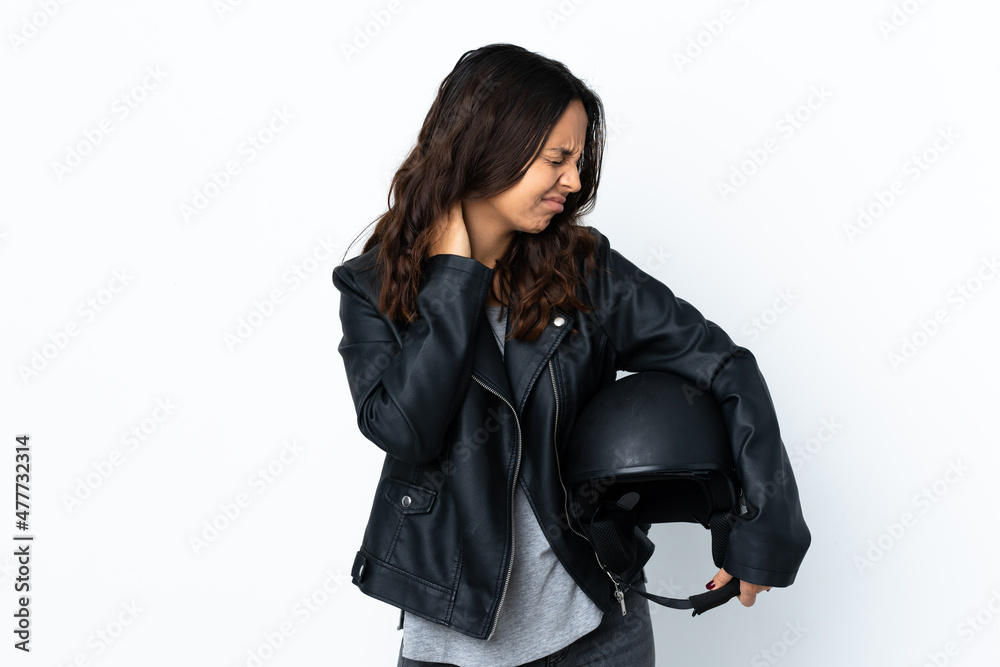 Young woman holding a motorcycle helmet over isolated white background with neckache Young woman holding a motorcycle helmet over isolated white background with neckache