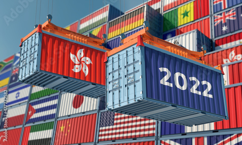Trading 2022. Freight container with Hong Kong national flag. 3D Rendering © Marius Faust