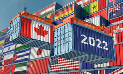 Trading 2022. Freight container with Canada national flag. 3D Rendering © Marius Faust