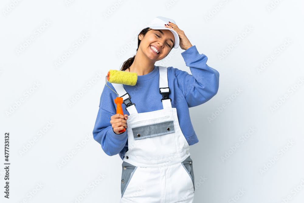 Painter woman over isolated white background smiling a lot Painter woman over isolated white background smiling a lot