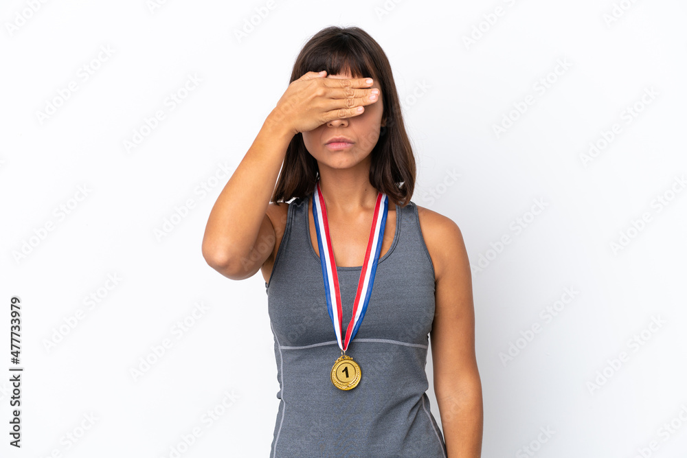 Young mixed race woman with medals isolated on white background covering eyes by hands. Do not want to see something Young mixed race woman with medals isolated on white background covering eyes by hands. Do not want to see something