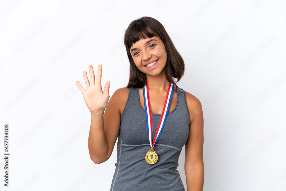 Young mixed race woman with medals isolated on white background counting five with fingers Young mixed race woman with medals isolated on white background counting five with fingers