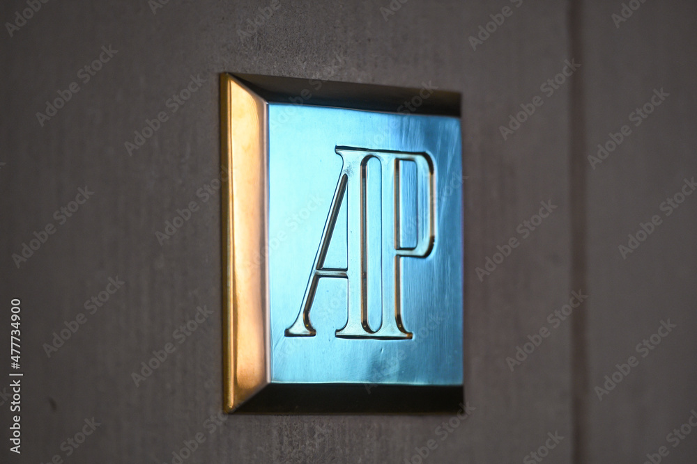 Audemars Piguet logo displayed on a facade of a store in Milan