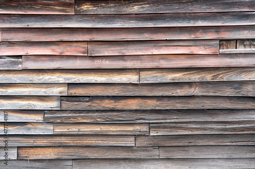 Fotografie Weathered Dilapidated Wooden Siding Background