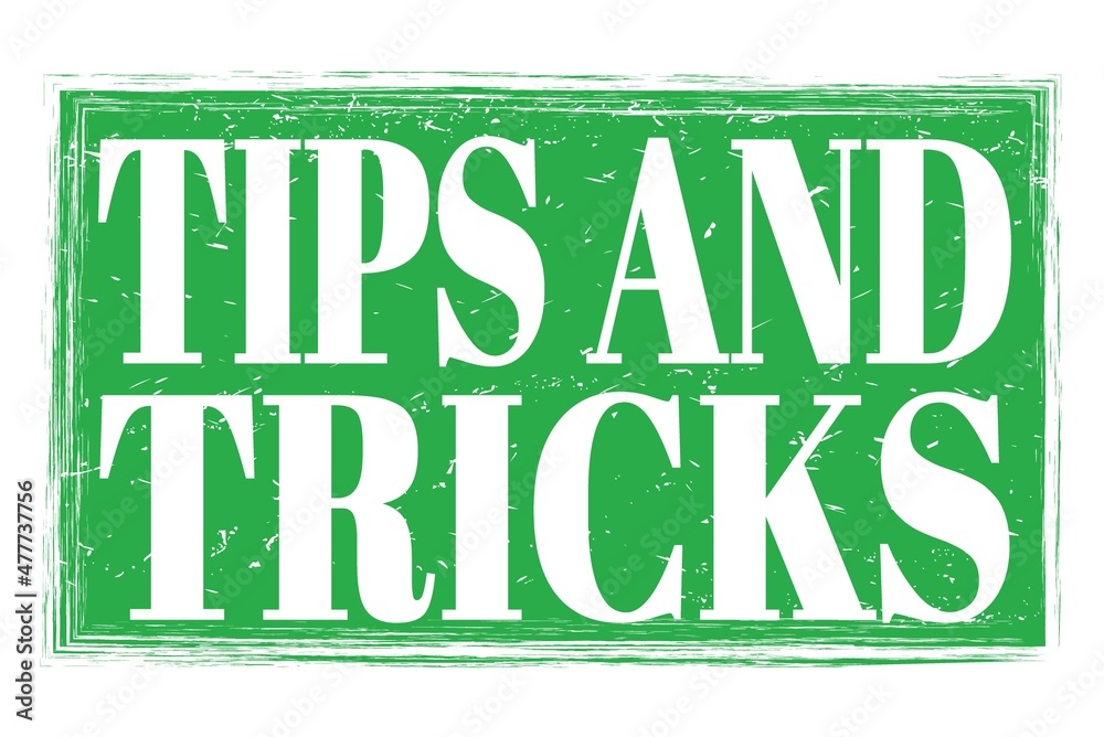 TIPS AND TRICKS, words on green grungy stamp sign TIPS AND TRICKS, words on green grungy stamp sign