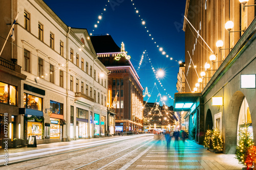 Helsinki, Finland. Night View Of Aleksanterinkatu Street With Railroad In Kluuvi District In Evening Christmas Xmas New Year Festive Illumination