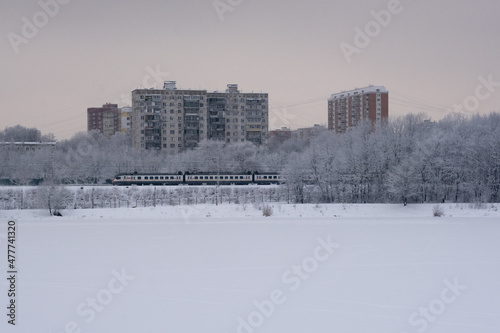 Magical winter in the park. Beautiful sky and white snow photo