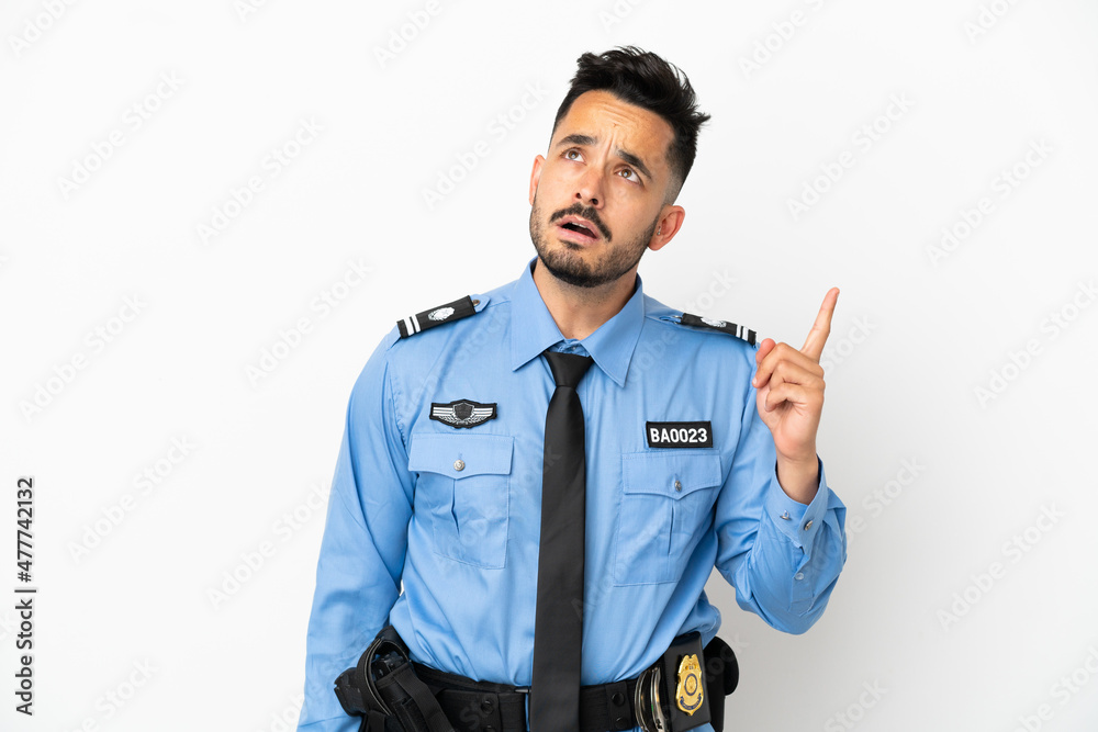 Police caucasian man isolated on white background thinking an idea pointing the finger up Police caucasian man isolated on white background thinking an idea pointing the finger up