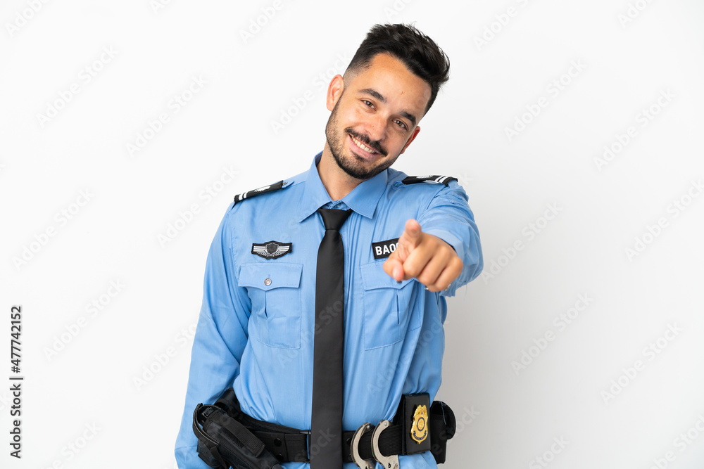 Police caucasian man isolated on white background pointing front with happy expression Police caucasian man isolated on white background pointing front with happy expression