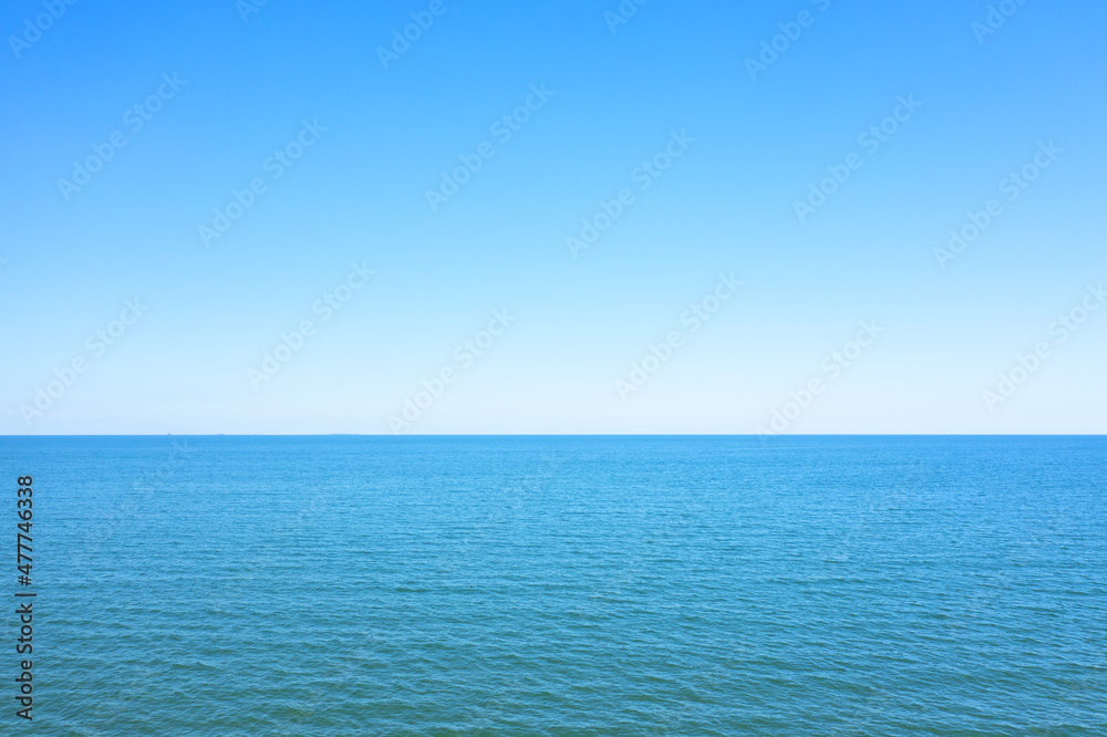 Blue sky over the Baltic Sea. Natural abstract background.