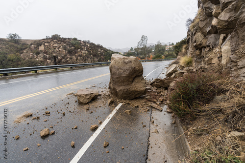 Rain storm landlide blocking traffic lane on Santa Susana Pass Road in the Chatsworth area of Los Angeles, California.   photo