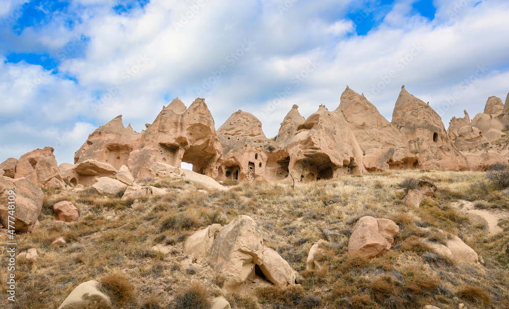 Zelve Valley in Goreme, Cappadocia, Turkey. Cave town and houses at rock formations.	