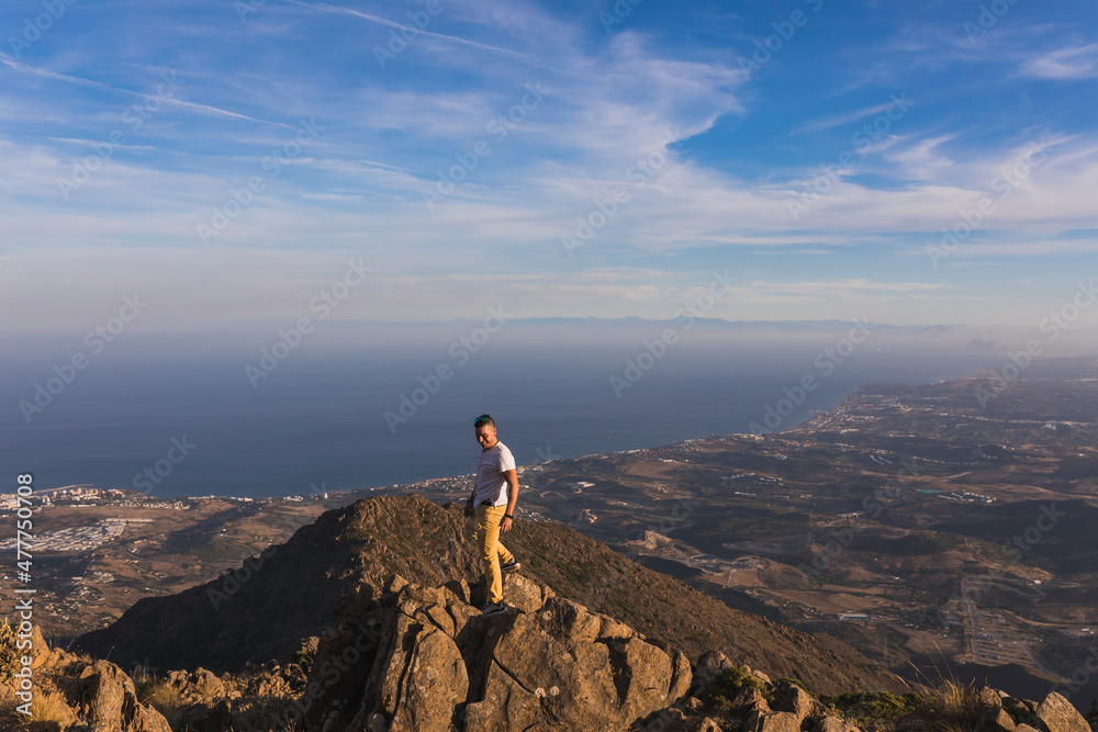 General view of a young man on top of Sierra Bermeja mountain, Malaga