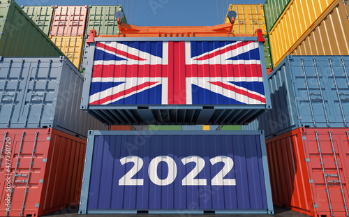 Trading 2022. Freight container with United Kingdom national flag. 3D Rendering © Marius Faust