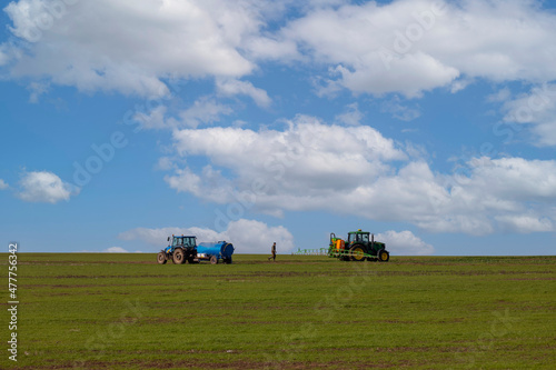 tractor plows the field to sow new crops
