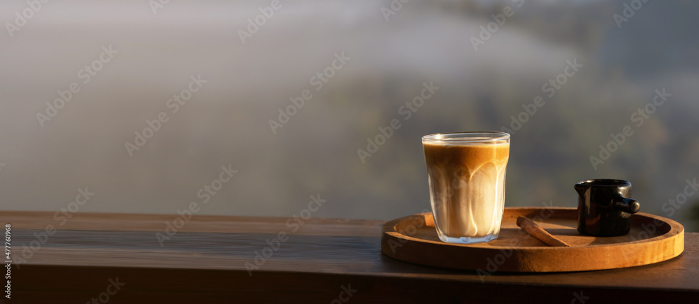 Morning16 Xxx Videos - Sunrise coffee in nature. Dirty coffee on wooden table with mountain fog on  shade of sunrise background. Good morning. 16:9 Stock Photo | Adobe Stock