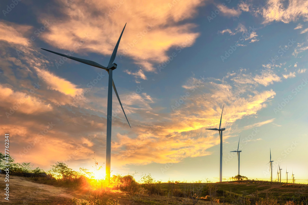 Fototapeta premium wind turbines or windmills farm field and mountain hill in Phetchabun, Thailand.