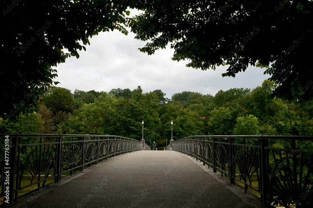 Munich, Germany: historical bridge over the Isar river