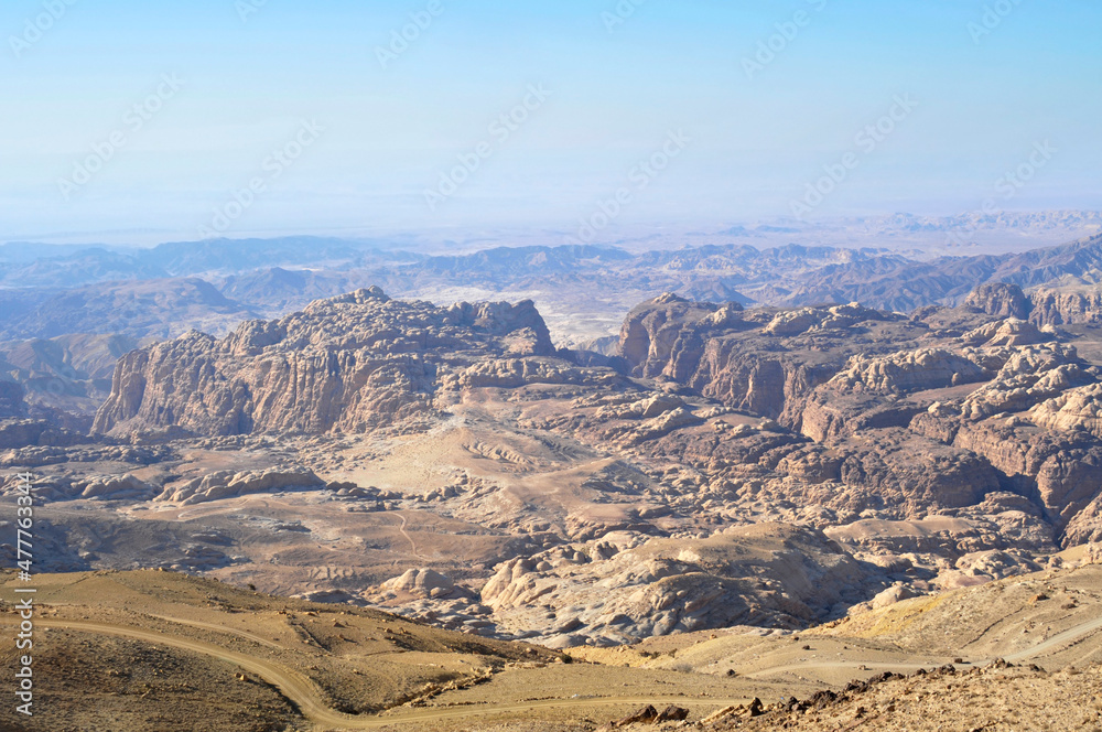 View of the mountains hiding the rocky town of Petra 