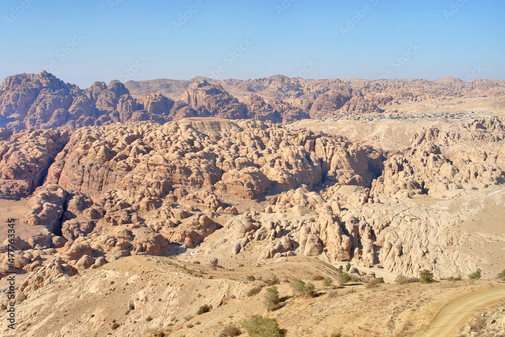 View of the mountains hiding the rocky town of Petra 