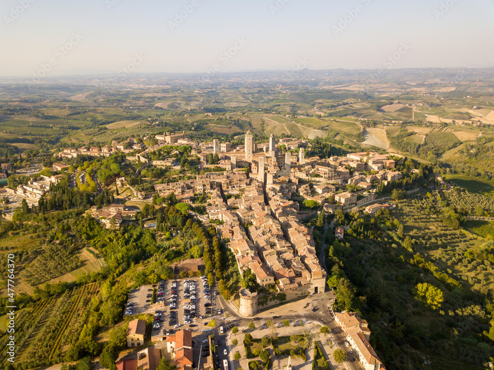 Aerial/Drone panorama of San Gimignano in the tuscany and its vineyards and olive trees, Tuscany Italy	