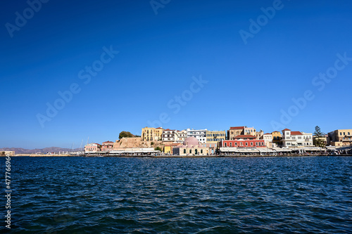 Historic mosque, houses and taverns in the port of Chania city