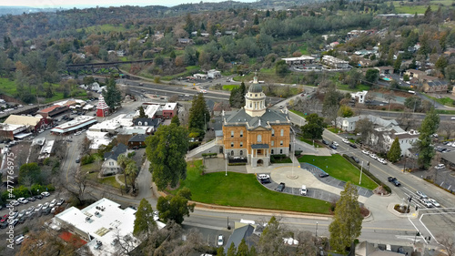 Downtown Old Auburn California with view of the Sierra Nevada Mountains. The Old Courthouse was recently renovated and is still a functioning government building. 