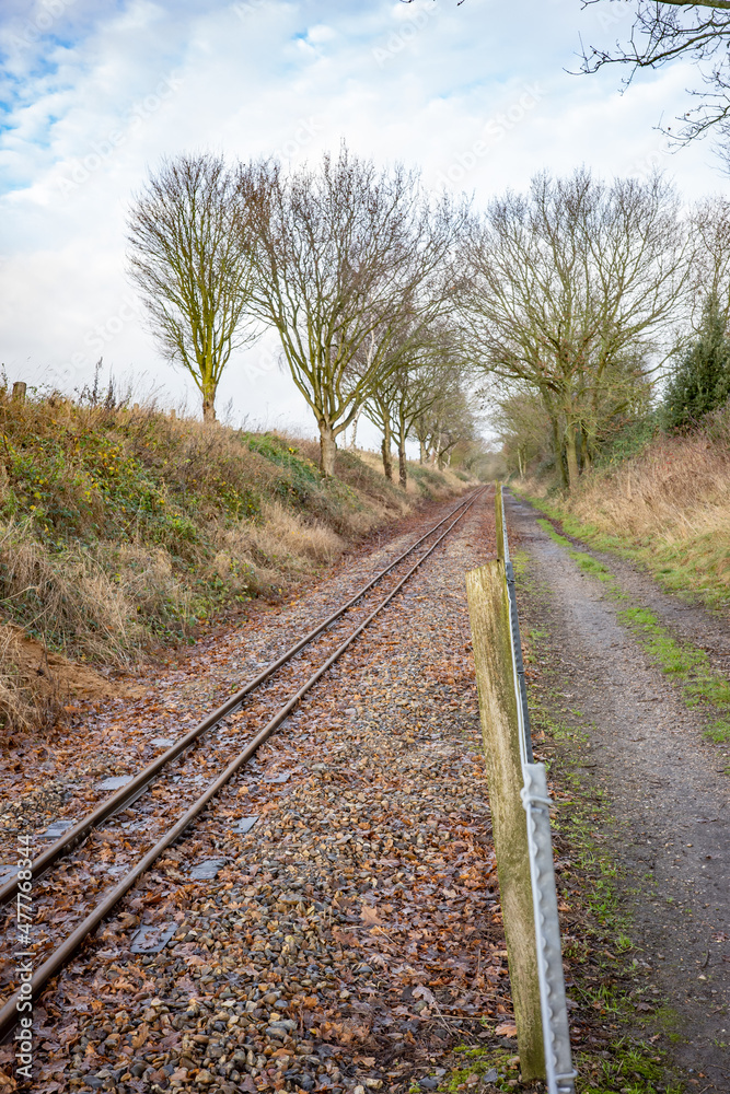 A section of the Bure Valley narrow gauge steam railway track in the Norfolk village of Buxton. Captured on a bright but cold winter’s day A section of the Bure Valley narrow gauge steam railway track in the Norfolk village of Buxton. Captured on a bright but cold winter’s day