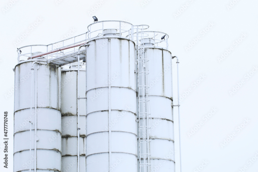 LUBIEN, POLAND - NOVEMBER 29, 2020: Silos for collecting loose raw materials in Lubien, Poland. LUBIEN, POLAND - NOVEMBER 29, 2020: Silos for collecting loose raw materials in Lubien, Poland.