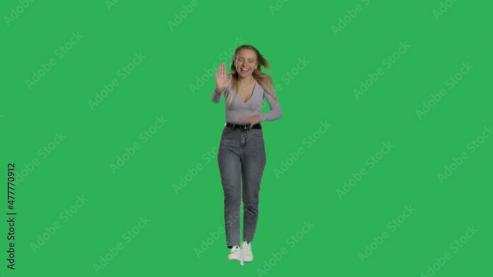 Young woman freezing over isolated background. Green screen chroma key Young woman freezing over isolated background. Green screen chroma key
