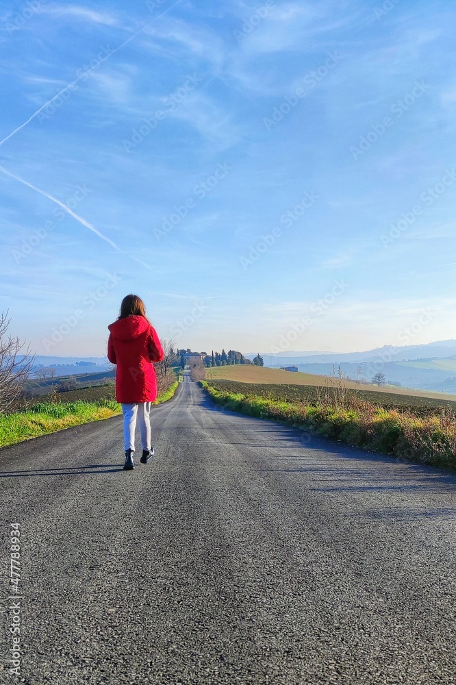 person Walking on the Road
