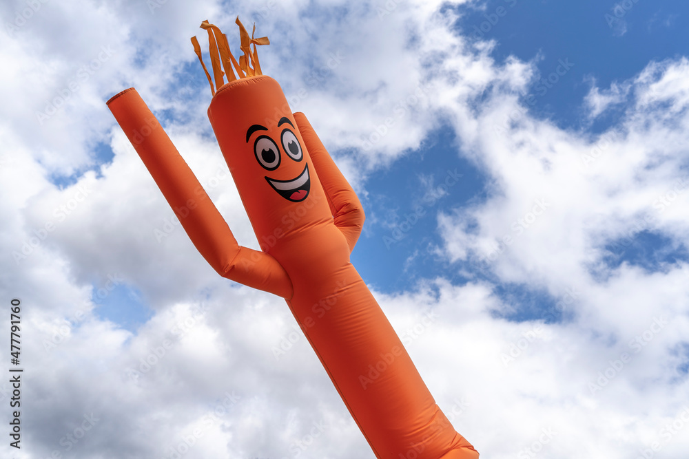 orange inflatable arm flailing tube man - obrazy, fototapety, plakaty 