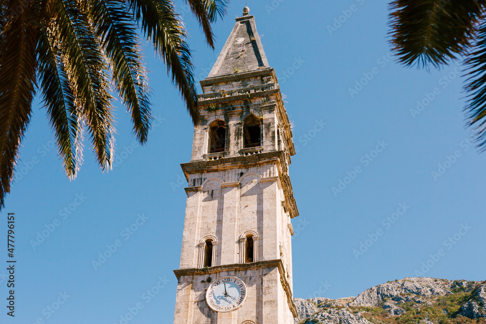 Bell tower with the clock of the Church of St. Nicholas. Montenegro