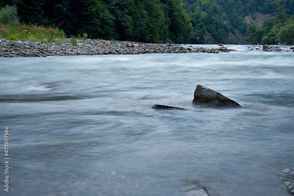 Obraz premium clean mountain river.