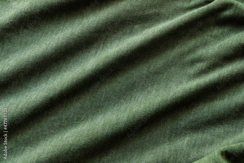 Fototapeta premium Elegant green silk, luxurious fabric texture, elegant background design.