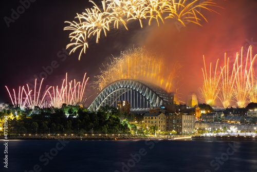 Sydney Harbour Bridge New Years Eve fireworks, colourful fire works lighting the night skies with vivid multi colours © Elias Bitar