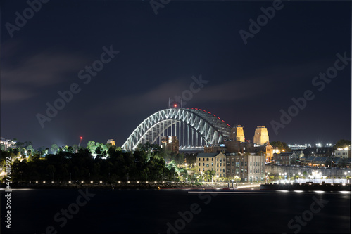 Sydney Harbour Bridge New Years Eve fireworks, colourful fire works lighting the night skies with vivid multi colours © Elias Bitar