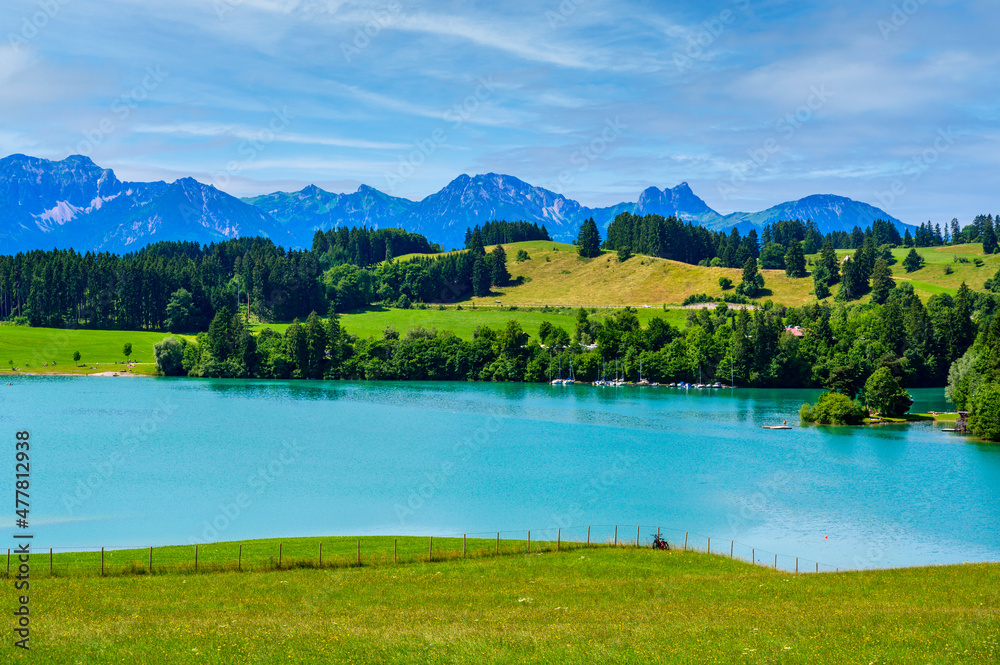 Forggensee - lake near Fuessen in beautiful mountain scenery of Allgaeu Alps, Bavaria, Germany