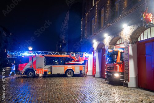 Berlin firefighters responding to a fire alarm on New Year's Eve from fire station 1300 in Berlin-Prenzlauer Berg. photo