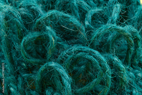 The fleecy surface of a sponge woven from jute rope