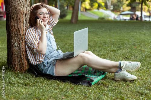 Hipster woman in park photo