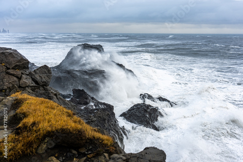 waves breaking on rocks Iceland