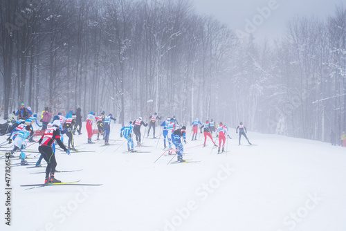 Professional nordic ski race in white snowy winter nature