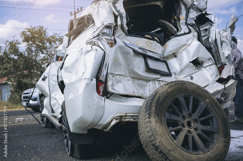 Car crash dangerous accident on the road. A car crashing damaged by another one on the road waiting for rescue.