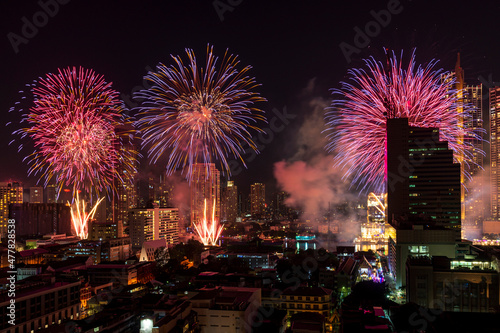 Thailand Countdown firework 2022 celebration with multicolor Japanese firework display on Chaophraya River, Bangkok city, Thailand