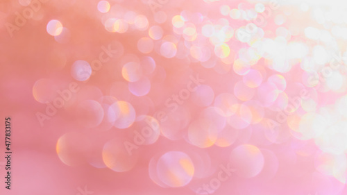 Bright glittering background in pink tones. Beautiful shiny bokeh