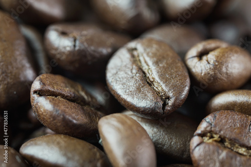 Roasted coffee beans background. Top view. Copy space 